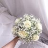 Bridal bouquet - white roses with baby breath